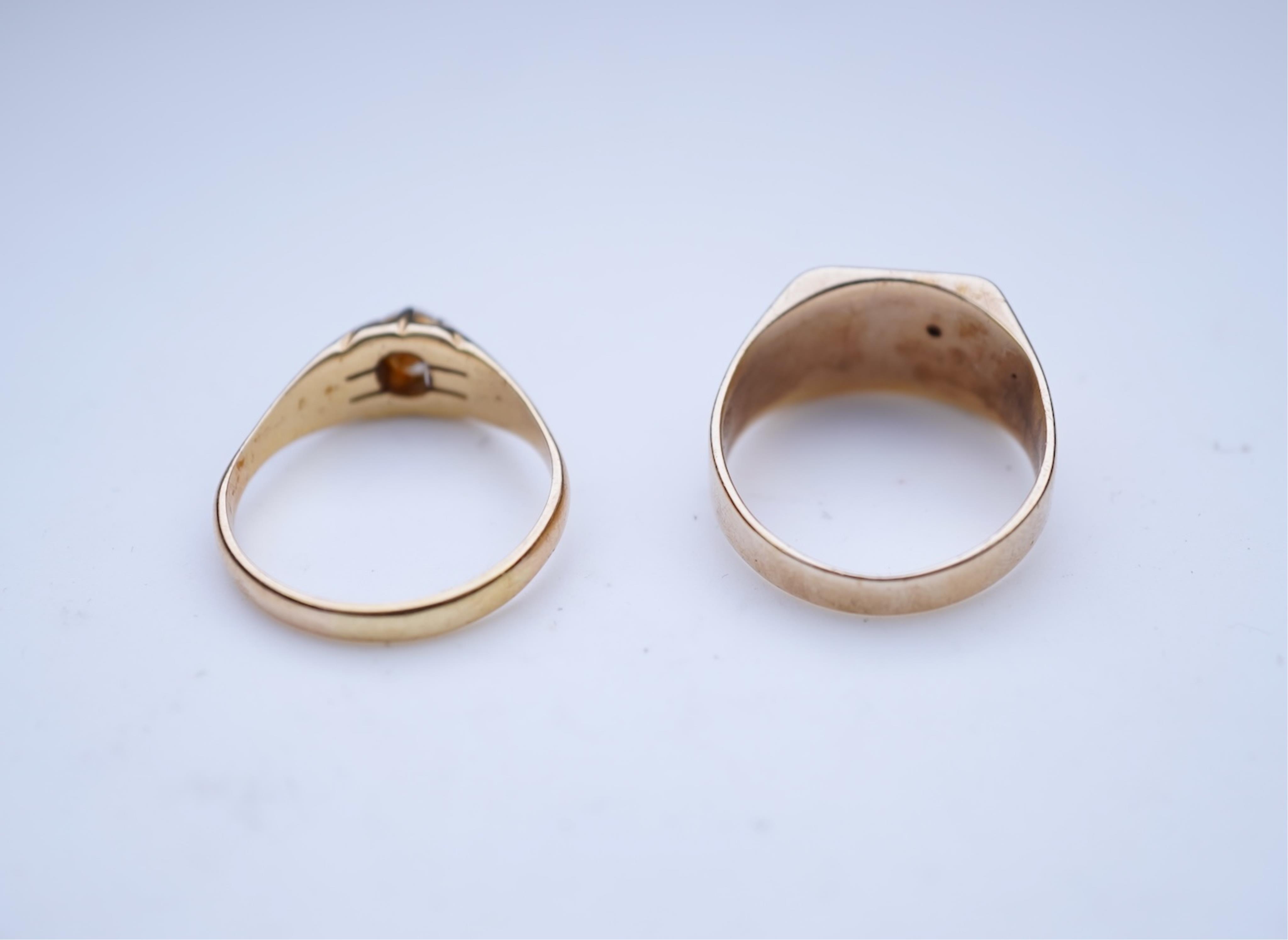 Two gold and diamond rings